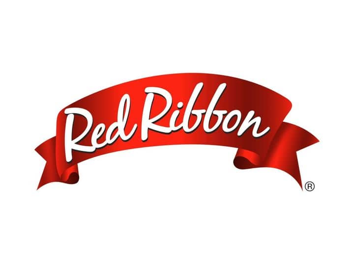 Paseo Outlets red ribbon